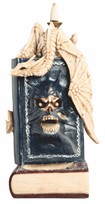 View Ivory Dragon on Blue Skull Book Backflow